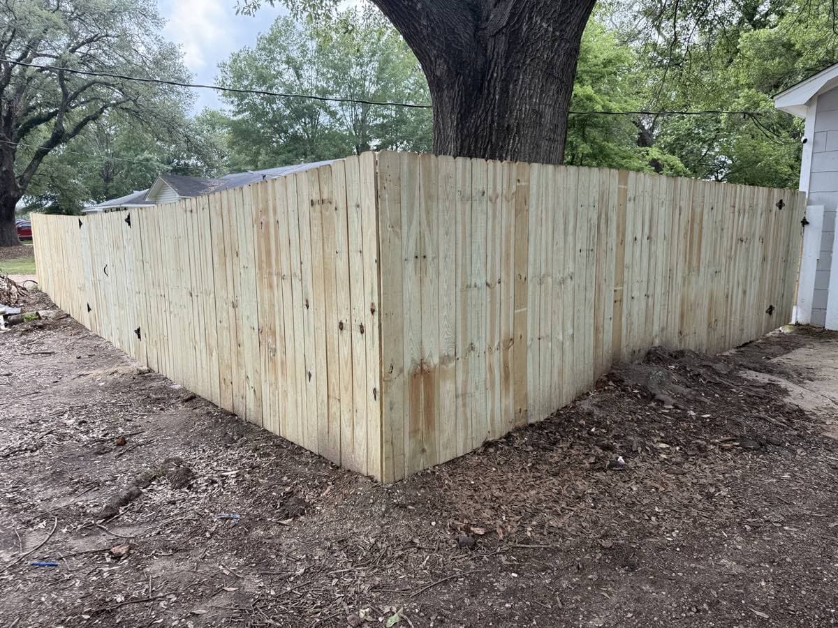 Privacy fence build — completed corner view — Fence installation and repair contractor in Monroe Louisiana